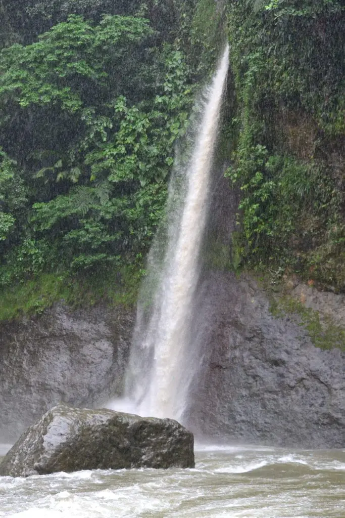 Top adventurous things to do in Costa Rica - Penas Blancas rafting, view of waterfall that can be seen while rafting the route
