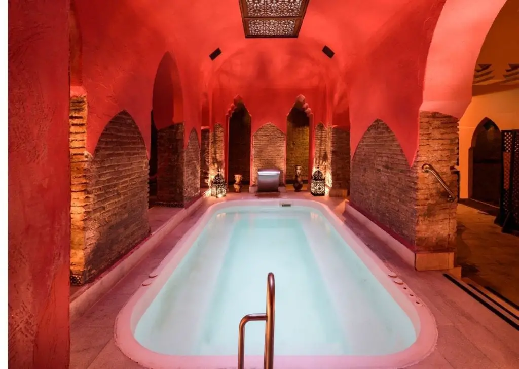 Epic things to do in Marrakech - hamman thermal public bath Epic things to do in Marrakech - lavish hamman public bath in red clay stone morrocan infused spa